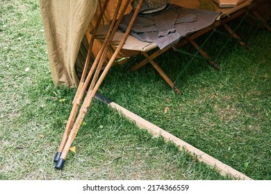 An Old Military Field Hospital With Retro Tents And Vintage Medical Beds From The First World War. Mobile Clinic For The Treatment Of Soldiers Of The Early Twentieth Century