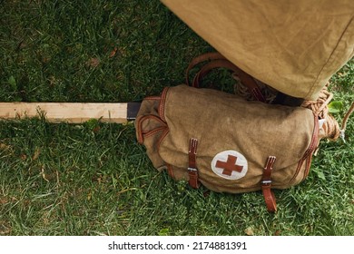 An Old Military Field Hospital With Retro Tents And Vintage Medical Beds With Red Cross. Mobile Clinic For The Treatment Of Soldiers Of The Early Twentieth Century - Moscow, Russia, June 13