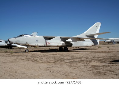 Old Military Plane In An Aircraft Graveyard In The Desert