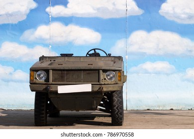 Old Military Truck Jeep Stand in Front of Blue Sky Demo Wall