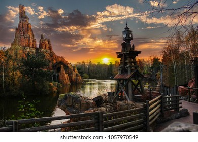 Old Mining Camp At The Riverside On A  Colorful Cloudy Day At Sunset