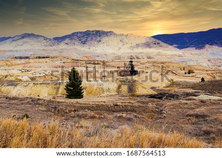 old mining headframes in a huge copper mine, Butte, Montana, United States                               