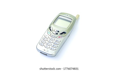 Old Mobile Phone On A White Background