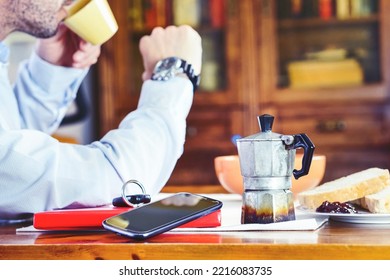 Old Mocha Coffee Machine With Businessman On Background Checking The Time - Vintage Coffeepot  On Home Table - Concept Of Business Man At Breakfast Time Ready For Working Day - Image