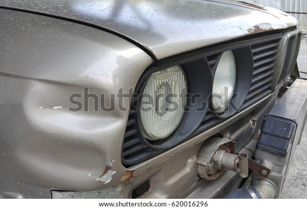 Old model BMW
damaged,dent
