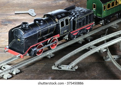 Old Model Railway On Wooden Background