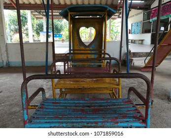 Old model train in the playground. - Powered by Shutterstock