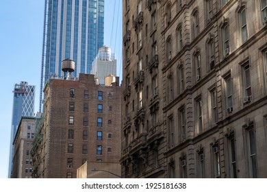 Old And Modern Buildings And Skyscrapers Along A Street In NoMad Of New York City