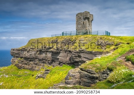 Old Moher Tower on Hags Head, watchtower at the southern end of Cliffs of Moher, popular tourist attraction, Wild Atlantic Way, County Clare, Ireland [[stock_photo]] © 