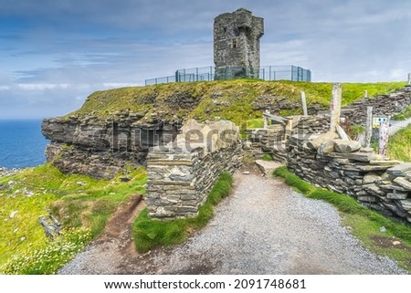 Old Moher Tower on Hags Head, watchtower at the southern end of Cliffs of Moher, popular tourist attraction, Wild Atlantic Way, County Clare, Ireland [[stock_photo]] © 