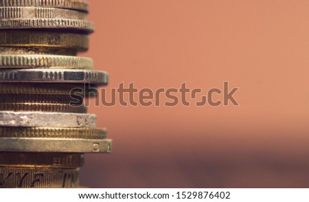 Old money and coins. Numismatics and collecting money. The Russian Empire and the world currency. Toning the image, space for text on the right selective focus.