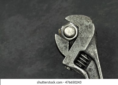 Old Monkey Wrench And Bolt Nut 