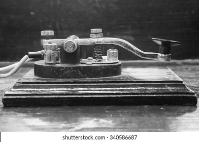 Old Morse Key Telegraph On Wood Table