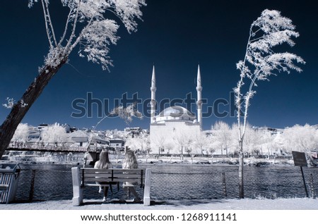 old mosque cami camii minaret infrared photo church with snowy trees two woman river religion religious turkey