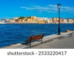 Old mosque at the seaside of old Venetian harbor at Greek town Chania at Crete island.