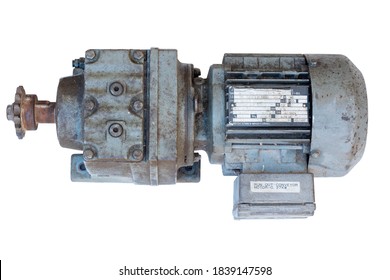 Old motor laid on the floor. The old motor is scrapped. Rusty old motor. Motor isolated on white background.  clipping path