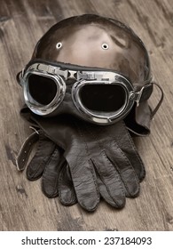 Old Motorcycle Helmet And Gloves