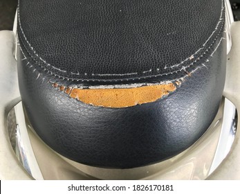 Old Motorcycle Leather Seat Damage And Torn.