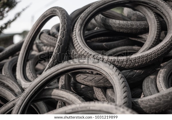 Old\
Motorcycle Tires Stack,Stack of used motorcycle\
tires