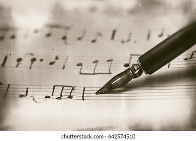 Old Musical Score With Fountain Pen Ruined Vintage Style Photograph