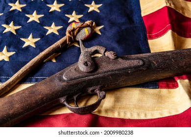 Old Musket Gun On American Flag