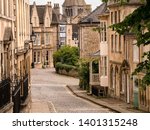 Old narrow cobbled street with stone houses, Barn Hill and All Saints Place, Stamford, Lincolnshire, England,UK