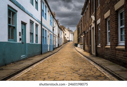 The old narrow street. Cobble stone street. Cobble stones on narrow street. Town street - Powered by Shutterstock