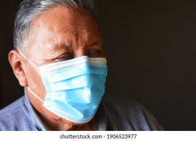 Old Native American Man Wearing Mask.