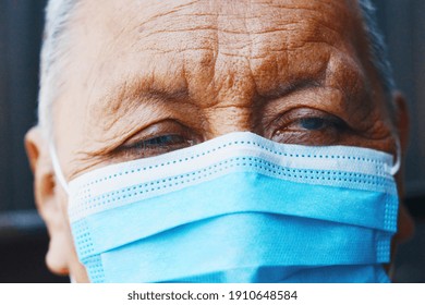 Old Native American Man Wearing Mask.