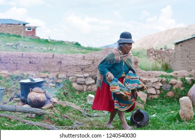 Old Native American Woman Cooking Outside.