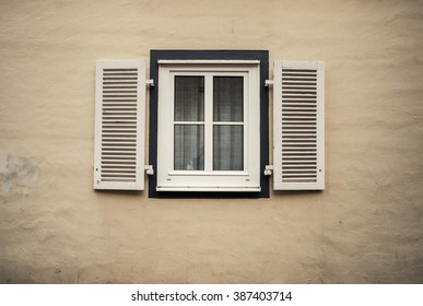 Old Neat Window With Blinders. Scandinavian Theme.
