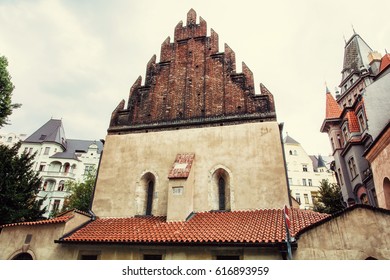 Old New Synagogue Near High Synagogue In Prague, Czech Republic. Architectural Theme. Religious Architecture. Retro Photo Filter.