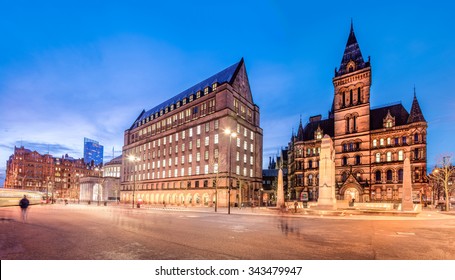 The old and new town hall buildings in the city centre of Manchester, England.