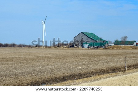 Old and new- vintage barn and Windmill