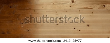Old and newly sanded wooden floor made of wooden planks