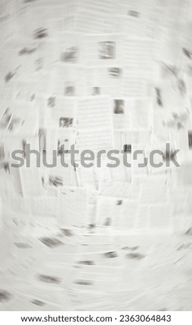 Old newspapers texture. Dynamically blurred background. Not sharp picture as Information dissemination concept. Design element