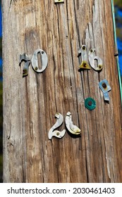Old numbers on light post