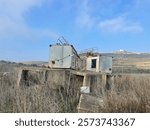 The Old Observations post are surrounded by  brown dried leaves, branches and drought bushes in hills Lebanon