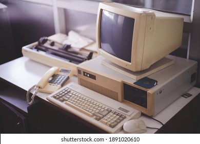 Old office and computer with obsolete technology