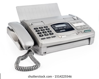 Old office fax machine shot on white background