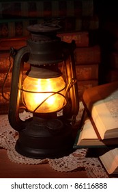 Old Oil Lamp And Old Books