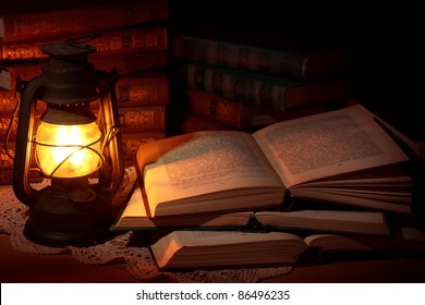 Old Oil Lamp And Old Books