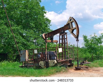 Old Oil Pupm Jack On The Oil Well