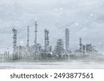 An old oil refinery in north pole snow tundra grass field snowstorm. Oil and Gas Energy power production in Siberia winter season.