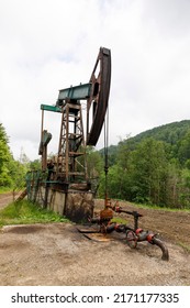 An Old Oil Rig Pumping Minerals.