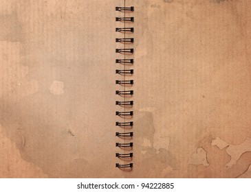 Old Open Spiral Brown stained Book Note background - Powered by Shutterstock