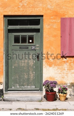 Old orange house of Nyboder district in Copenhagen, Denmark	