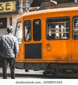 Old orange tram in the historic city center of Turin, Italy - Powered by Shutterstock