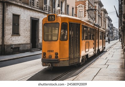 Old orange tram in the historic city center of Turin, Italy - Powered by Shutterstock