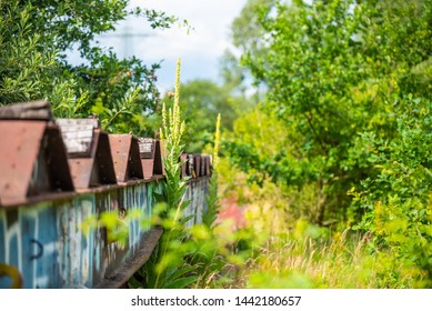 Old Orphan Train Wagon Stands On A No-longer-used Siding